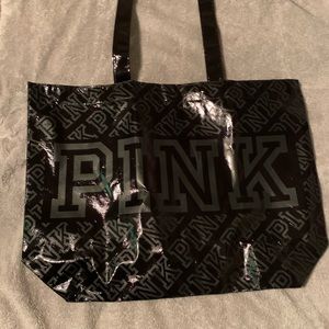 Pink bottle . Pink bag , pink bodysuit